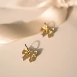 Take A Bow - korvikset - kulta